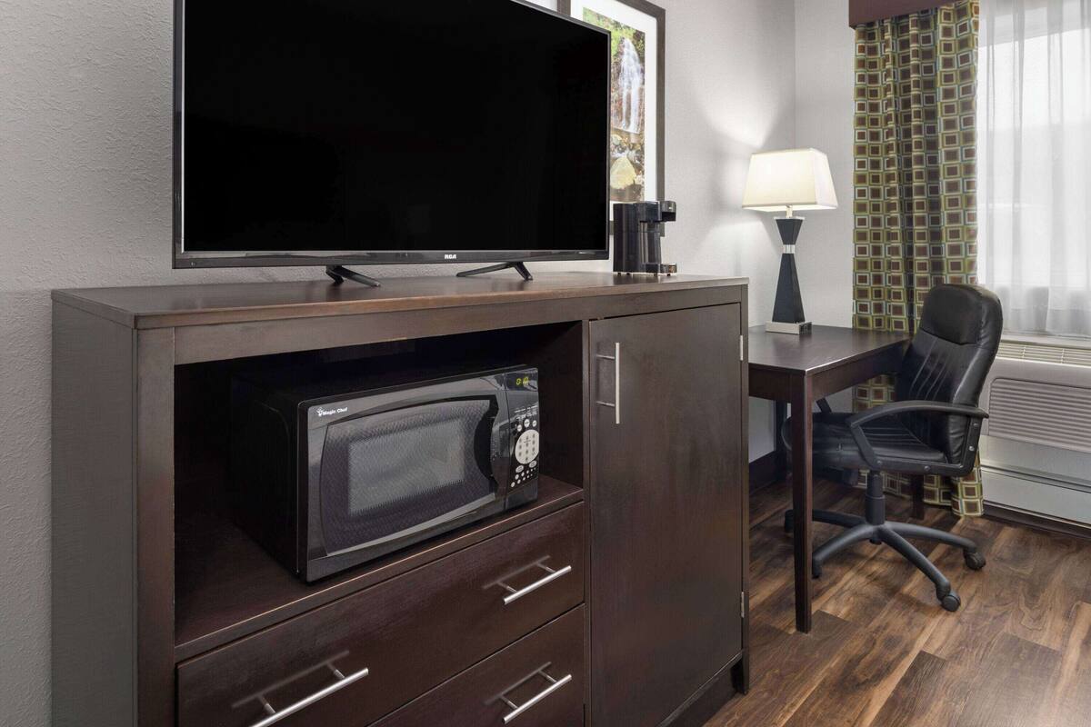 pillow-top beds, desk, laptop workspace, soundproofing