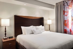 Hypo-allergenic bedding, desk, blackout drapes, iron/ironing board