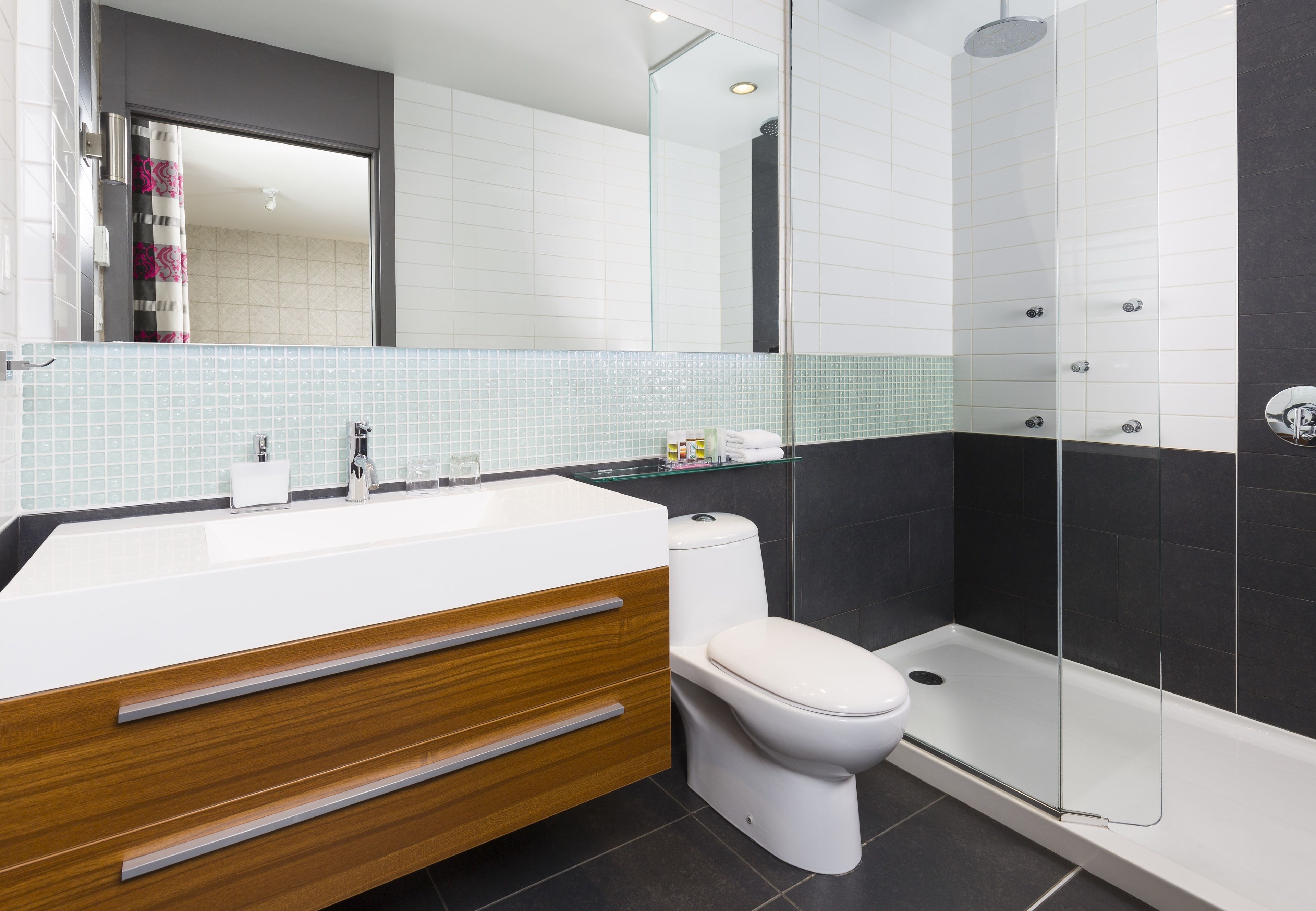 shower, rainfall showerhead, designer toiletries, hair dryer