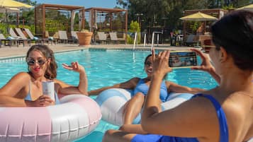 Outdoor pool, open 7:00 AM to 10:00 PM, cabanas (surcharge)