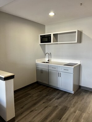 Suite, 1 King Bed (Mini) | Private kitchen | Fridge, microwave, coffee/tea maker