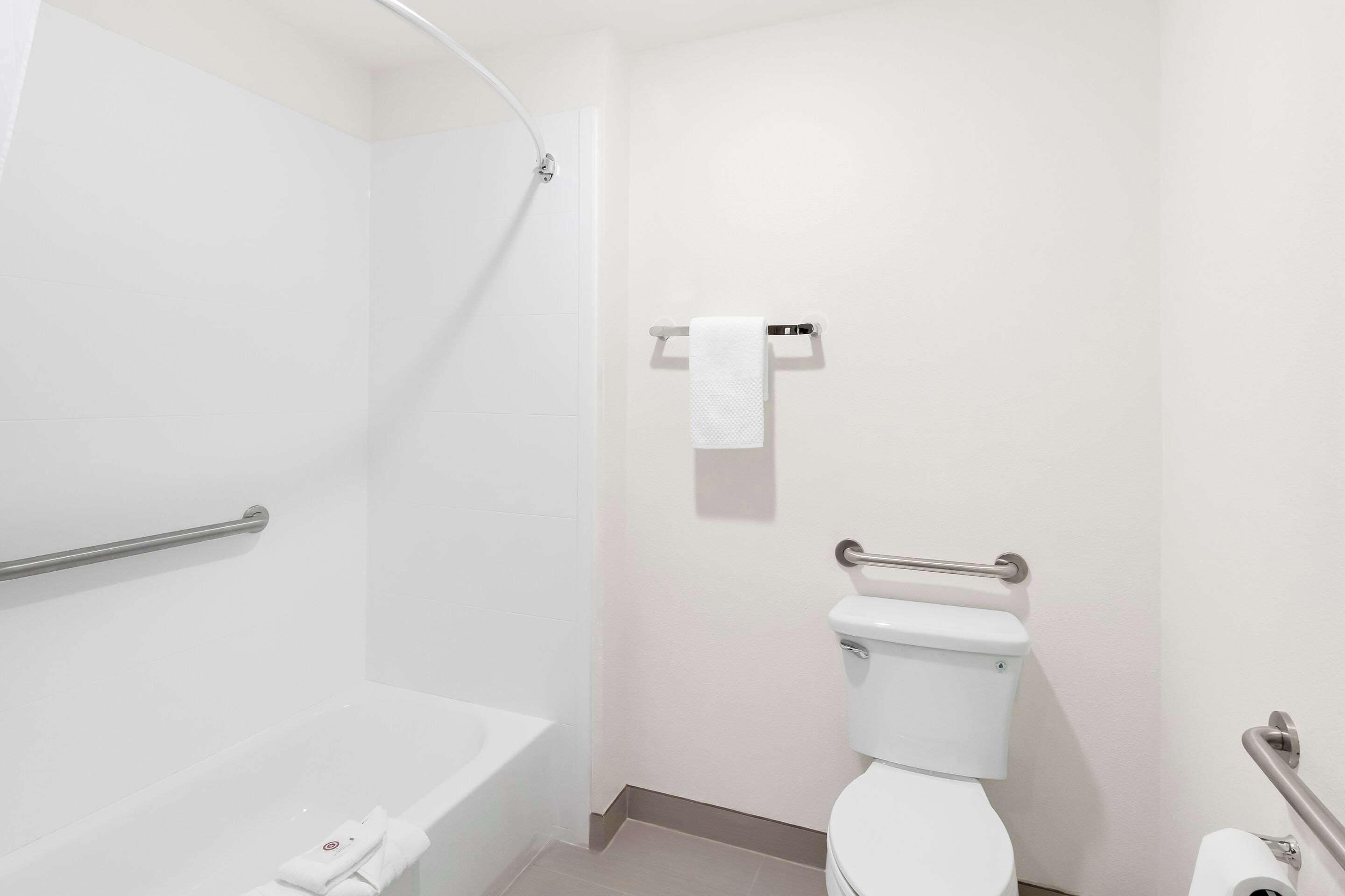 desk, laptop workspace, blackout curtains, iron/ironing board