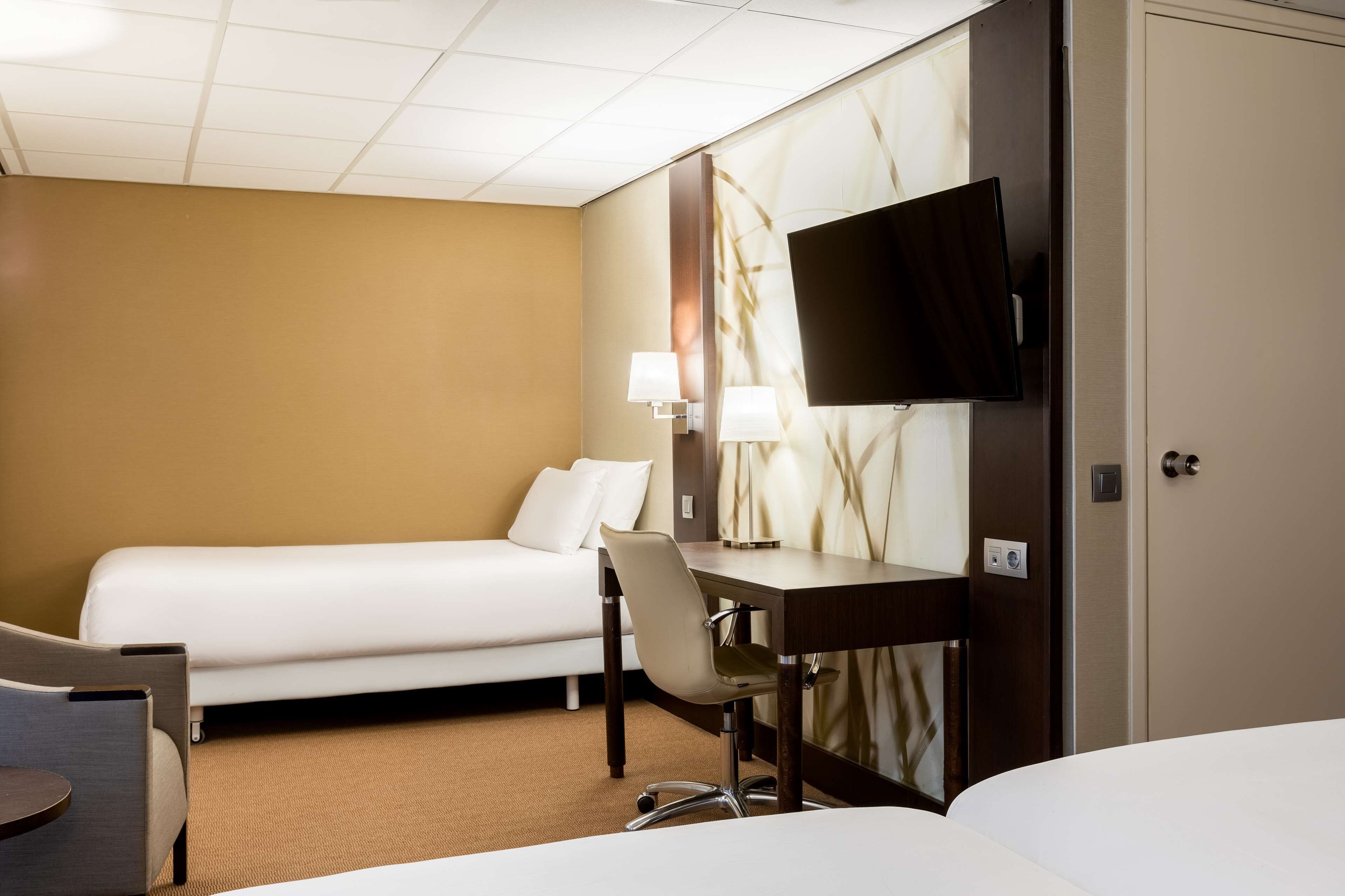 standard triple room | in-room safe, desk, free cots/infant beds, free rollaway beds