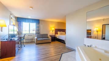 Studio suite, 1 kingsize bed, niet-roken | Een bureau, een strijkplank/strijkijzer, gratis babybedden, gratis wifi