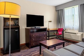Suite, 1 King Bed, Non Smoking, Jetted Tub | 1 bedroom, desk, laptop workspace, iron/ironing board