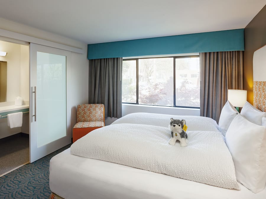 Premium bedding, down duvets, pillow-top beds, in-room safe
