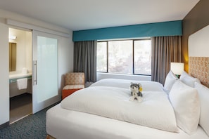 Premium bedding, down duvets, pillow-top beds, in-room safe