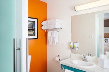 Premium bedding, down comforters, pillowtop beds, in-room safe at Staypineapple, University Inn, University District Seattle