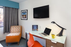 Premium bedding, down comforters, pillowtop beds, in-room safe