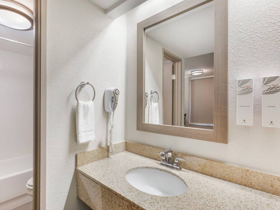 Hair dryer, towels, soap, shampoo