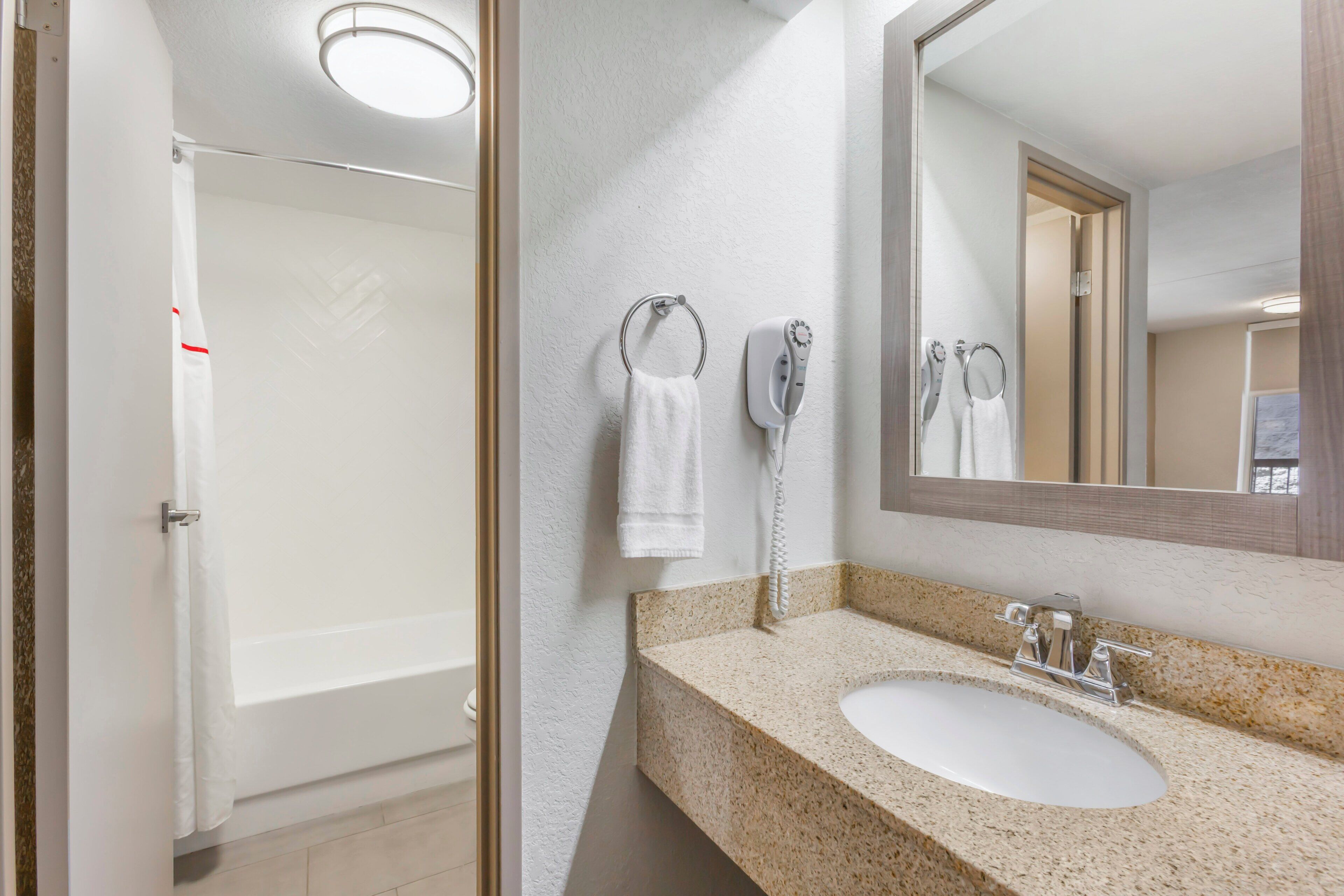 hair dryer, towels, soap, shampoo