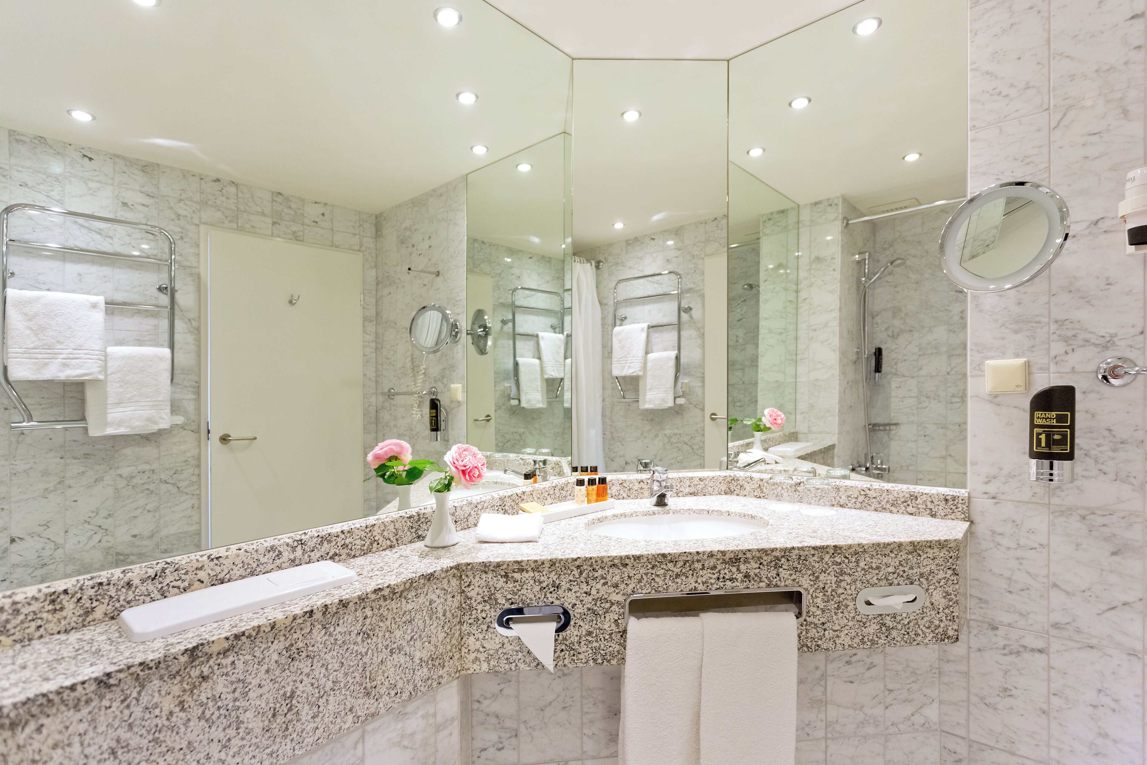 combined shower/bathtub, rainfall showerhead, hair dryer, towels