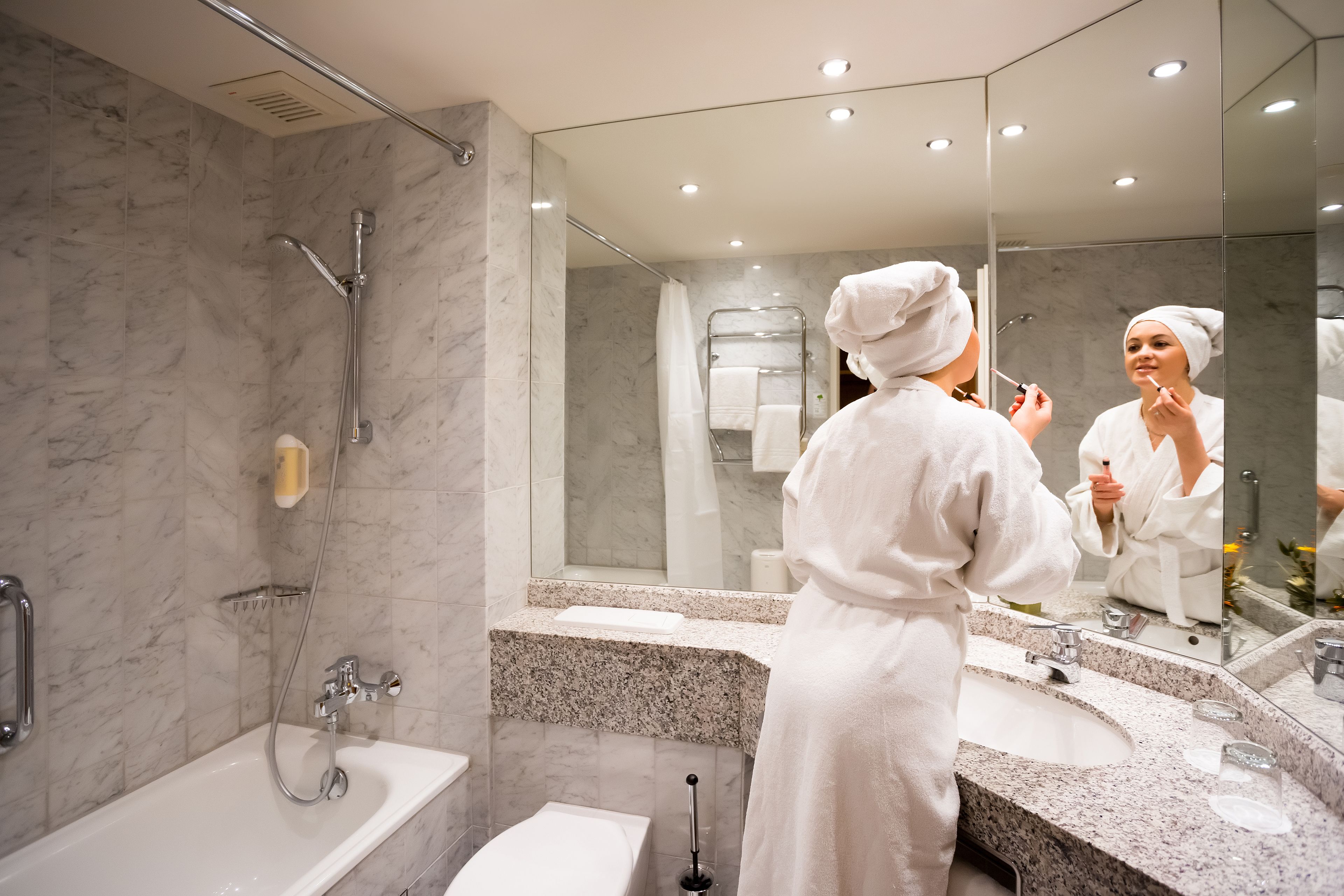 double room comfort | bathroom | combined shower/bathtub, rainfall showerhead, hair dryer, towels