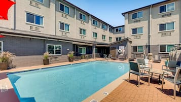 Outdoor pool, open 10:00 AM to 10:00 PM, pool umbrellas, sun loungers