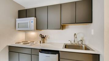 Suite, 1 King Bed | Private kitchen | Fridge, microwave, coffee/tea maker