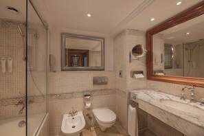 Bathtub, eco-friendly toiletries, hair dryer, towels