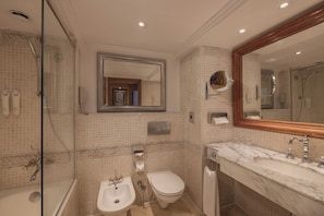 Bathtub, eco-friendly toiletries, hair dryer, towels