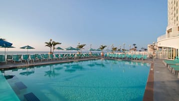Indoor pool, seasonal outdoor pool, pool umbrellas, sun loungers