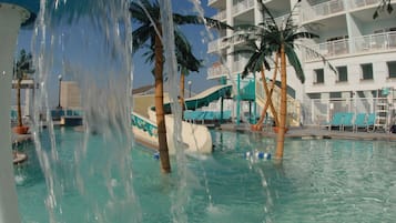 Indoor pool, seasonal outdoor pool, pool umbrellas, pool loungers