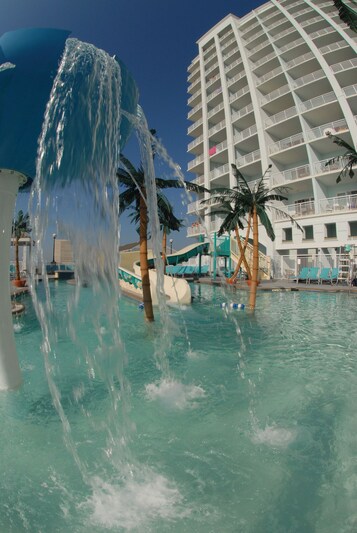 Indoor pool, seasonal outdoor pool, pool umbrellas, pool loungers