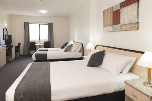 Family Room (2 Adults + 2 Children) | Minibar, desk, iron/ironing board, bed sheets