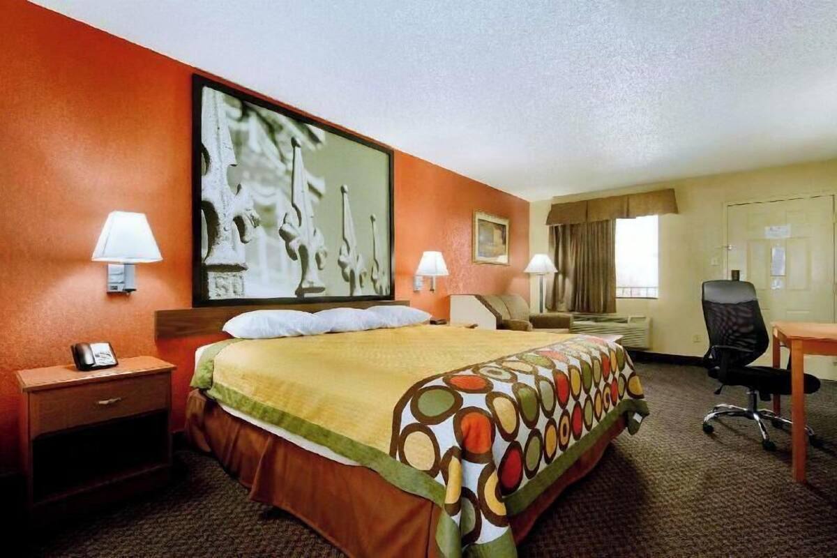 Desk, blackout curtains, free cots/infant beds, bed sheets