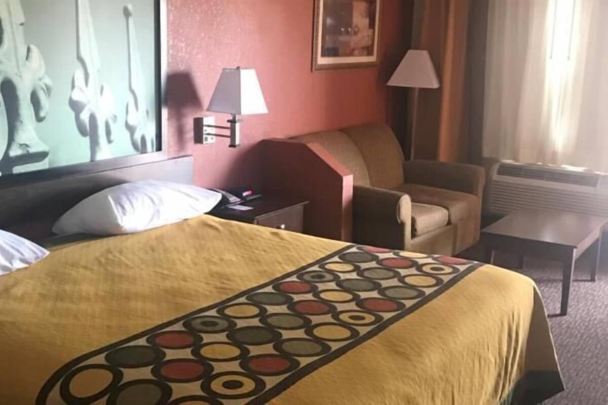 Desk, blackout curtains, free cots/infant beds, bed sheets