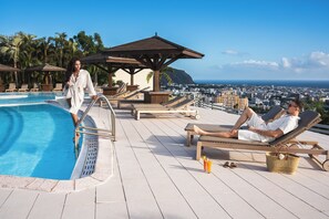 Outdoor pool, open 7:00 AM to 9:00 PM, sun loungers