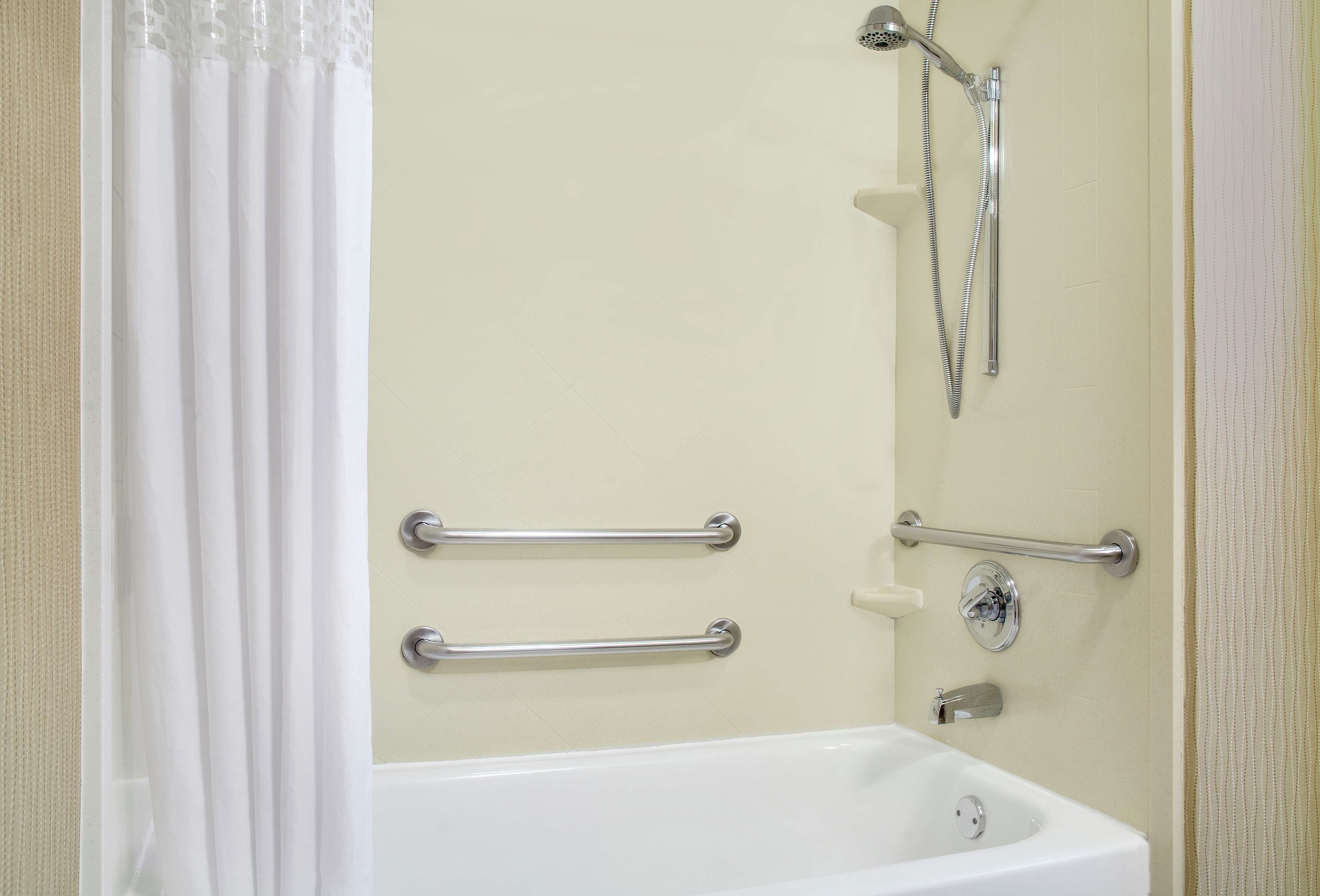 combined shower/bathtub, free toiletries, hair dryer, towels