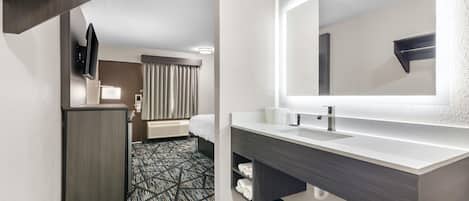 Separate tub and shower, rainfall showerhead, free toiletries