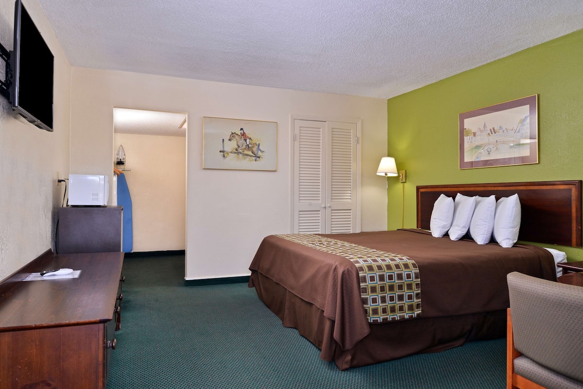 Desk, blackout drapes, iron/ironing board, rollaway beds