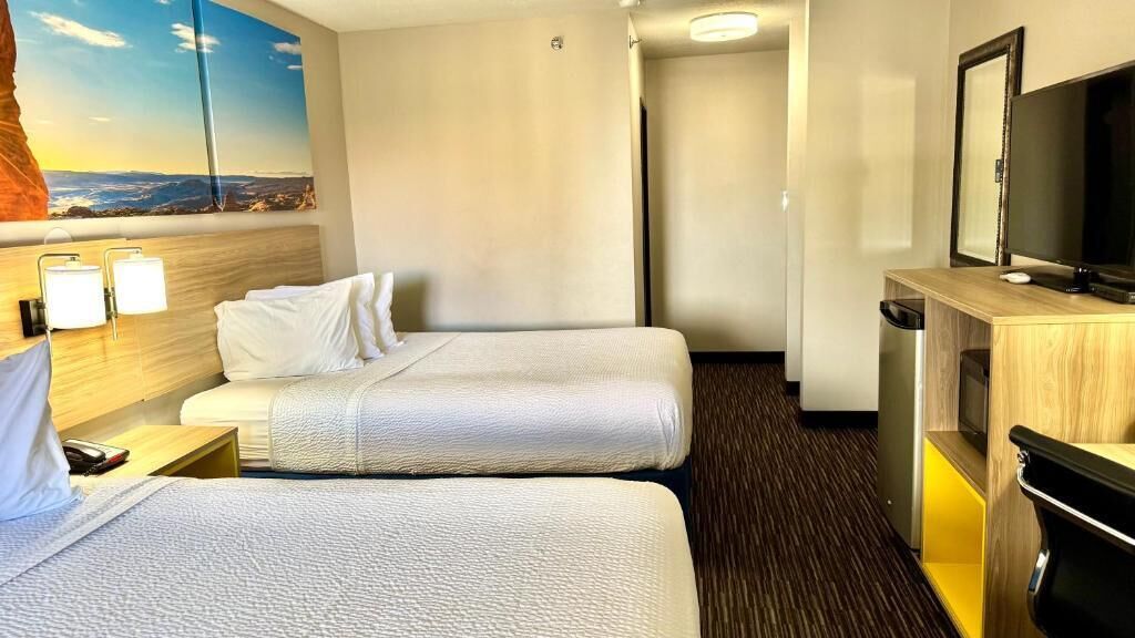 Standard Room, 2 Queen Beds | Desk, blackout drapes, iron/ironing board, WiFi (free)