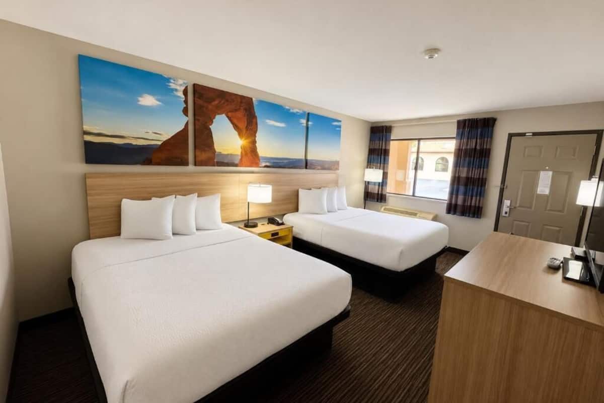 Standard Room, 2 Queen Beds | Desk, blackout drapes, iron/ironing board, WiFi (free)