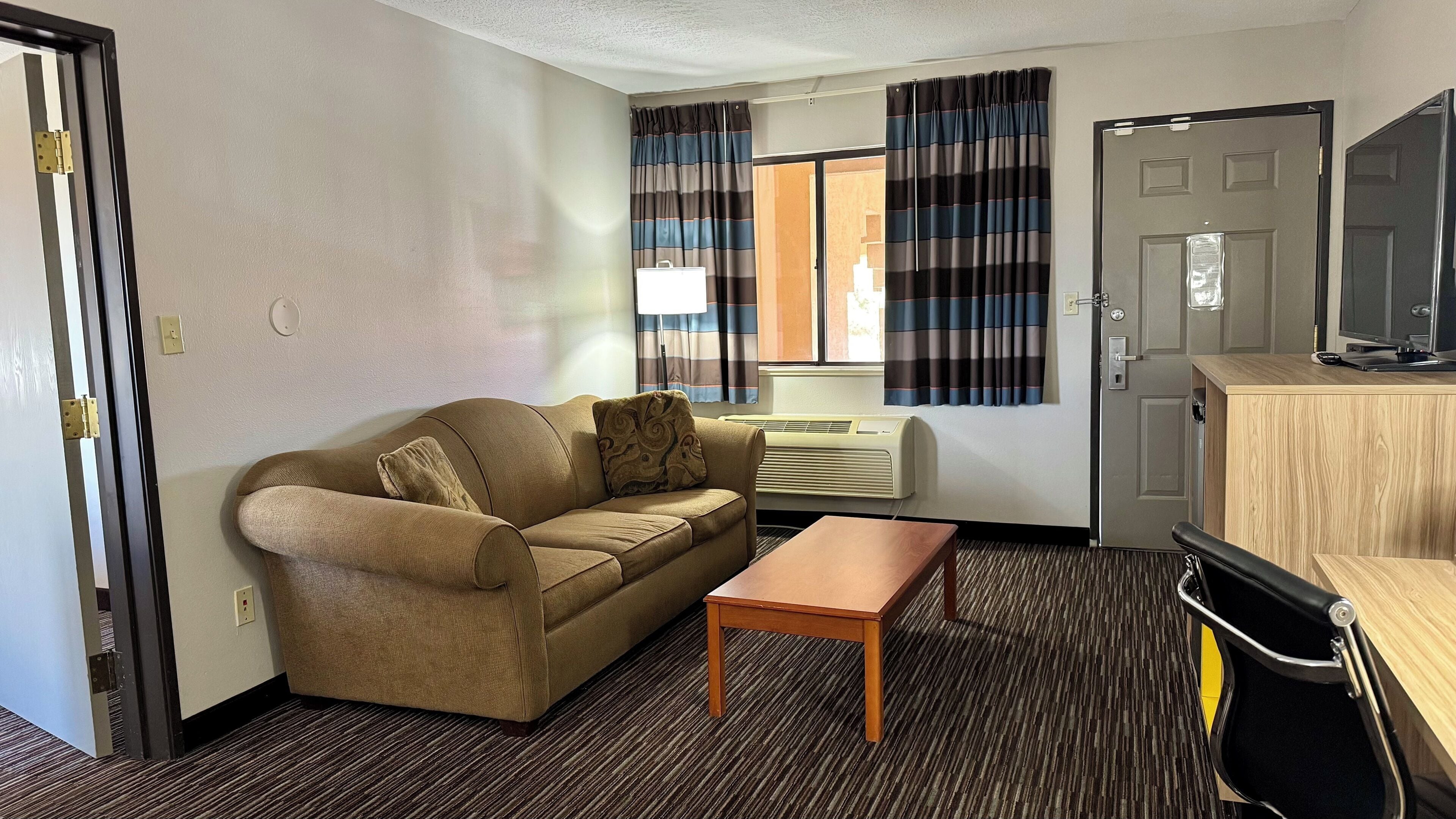 One-Bedroom Suite, 1 King Bed, Non Smoking | Desk, blackout drapes, iron/ironing board, WiFi (free)