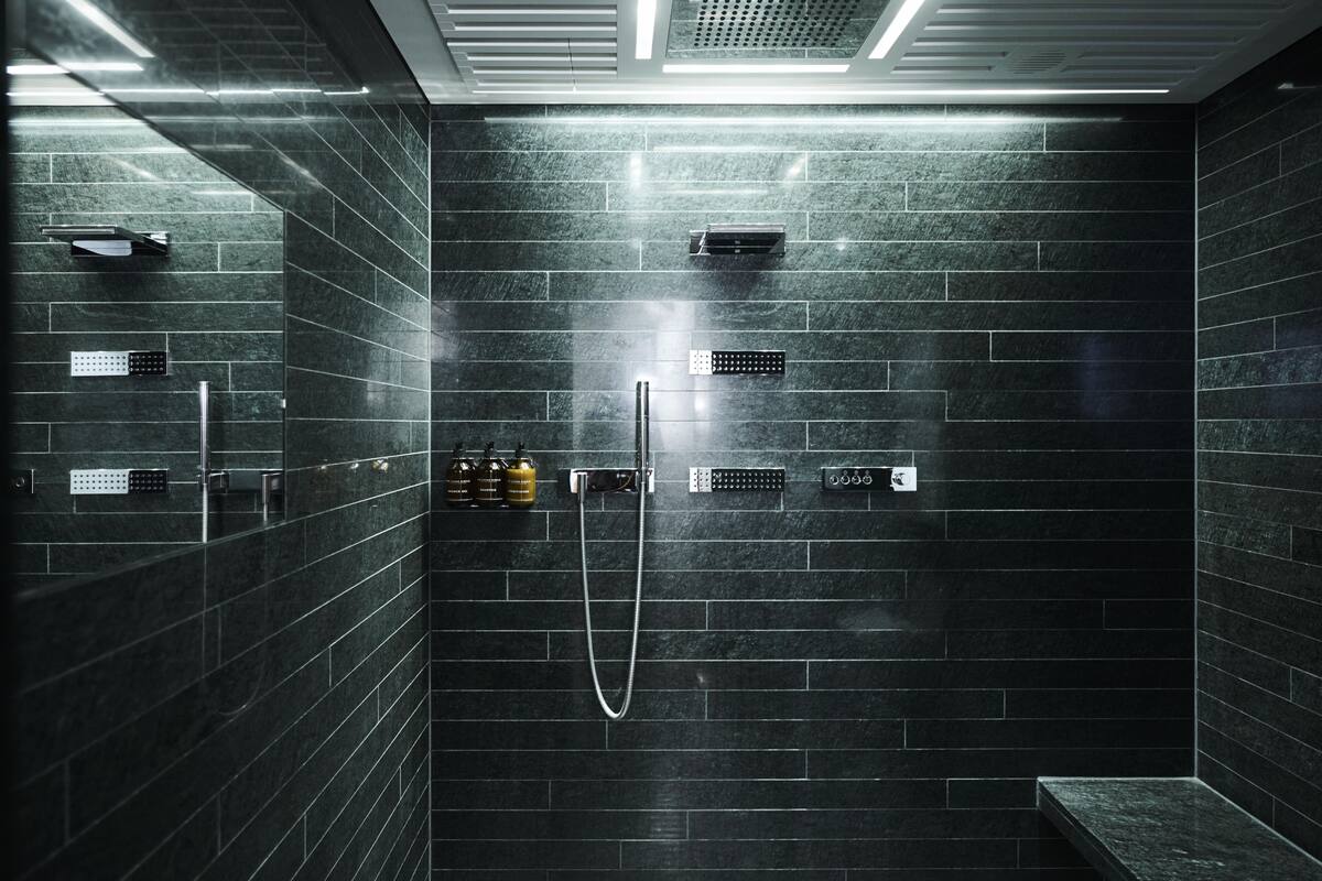 courtyard suite with spa shower | bathroom | designer toiletries, hair dryer, bathrobes, slippers