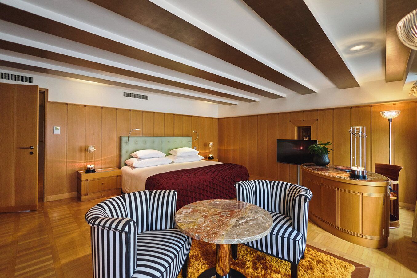 Hypo-allergenic bedding, free minibar, in-room safe