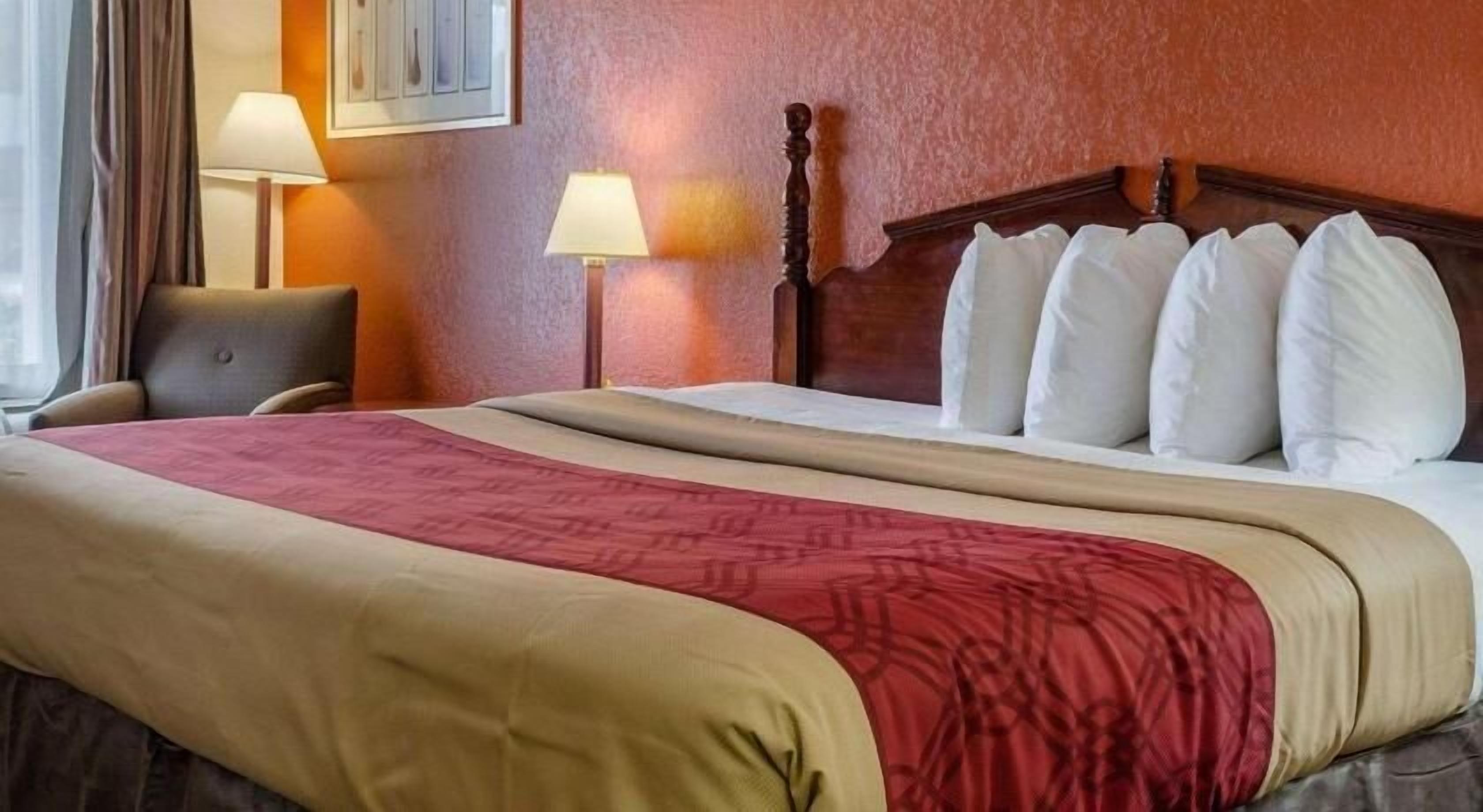 Blackout drapes, iron/ironing board, rollaway beds, free WiFi
