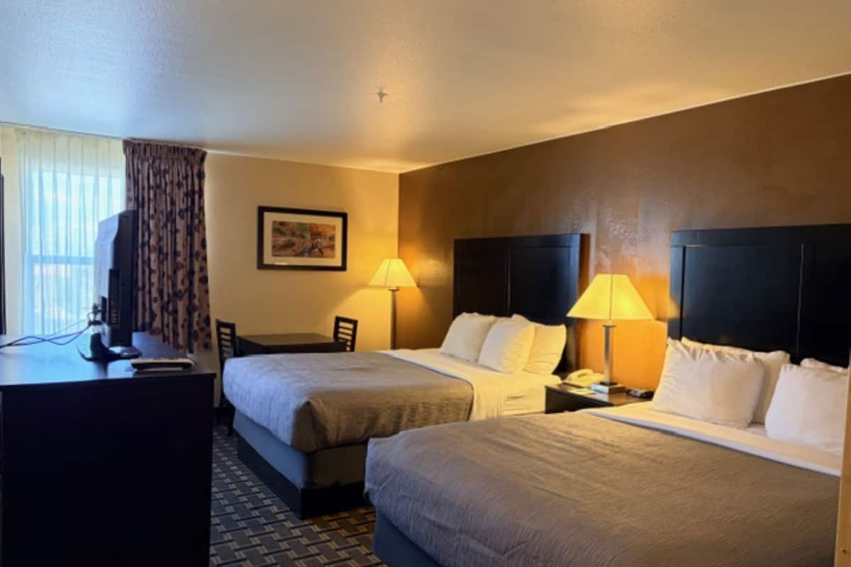 Desk, iron/ironing board, free cribs/infant beds, rollaway beds