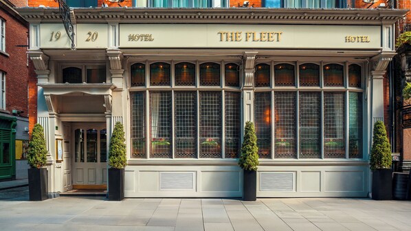 A classic building with the name "The Fleet Hotel" above the entrance. - The Fleet (Dublin)