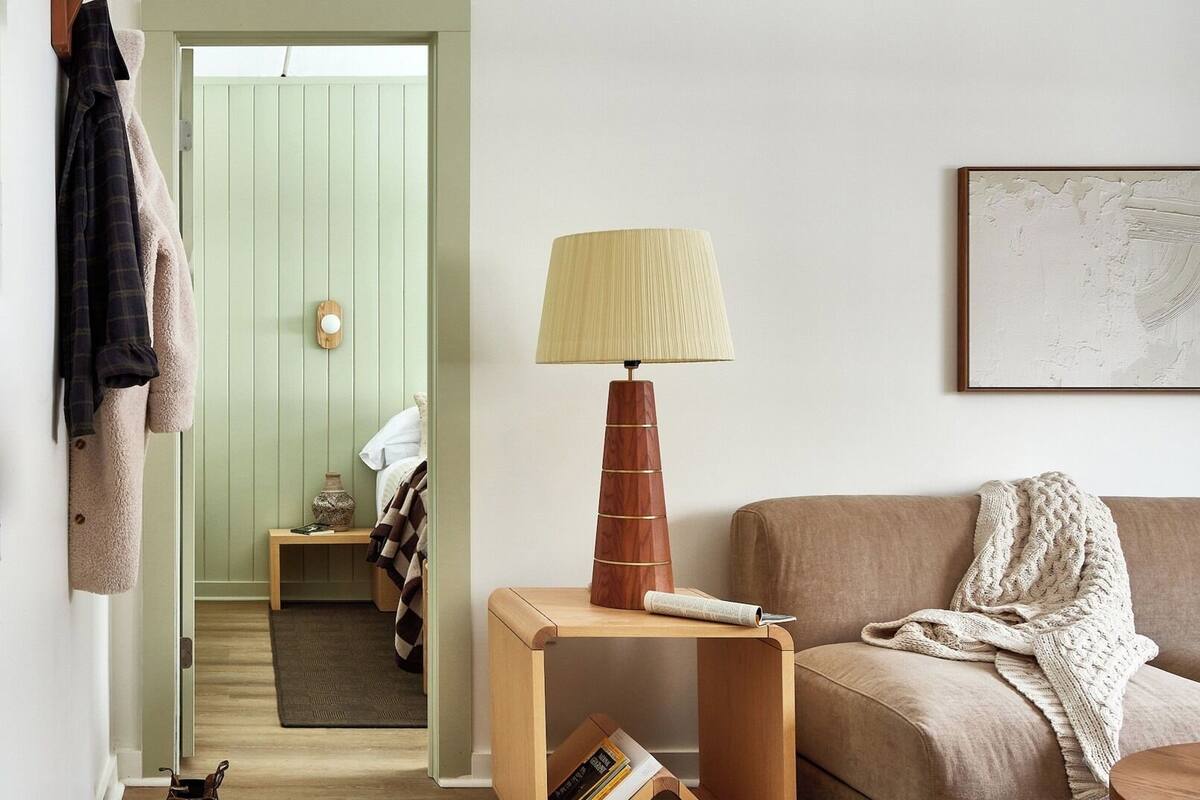 Premium bedding, blackout curtains, iron/ironing board (on request)
