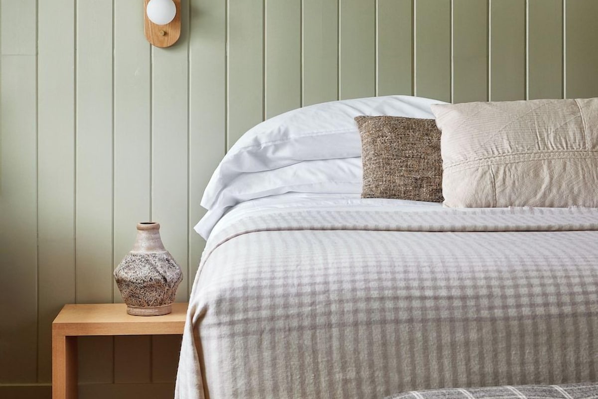 Premium bedding, blackout drapes, iron/ironing board (on request)