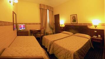 Triple room | Down duvets, minibar, in-room safe, individually furnished