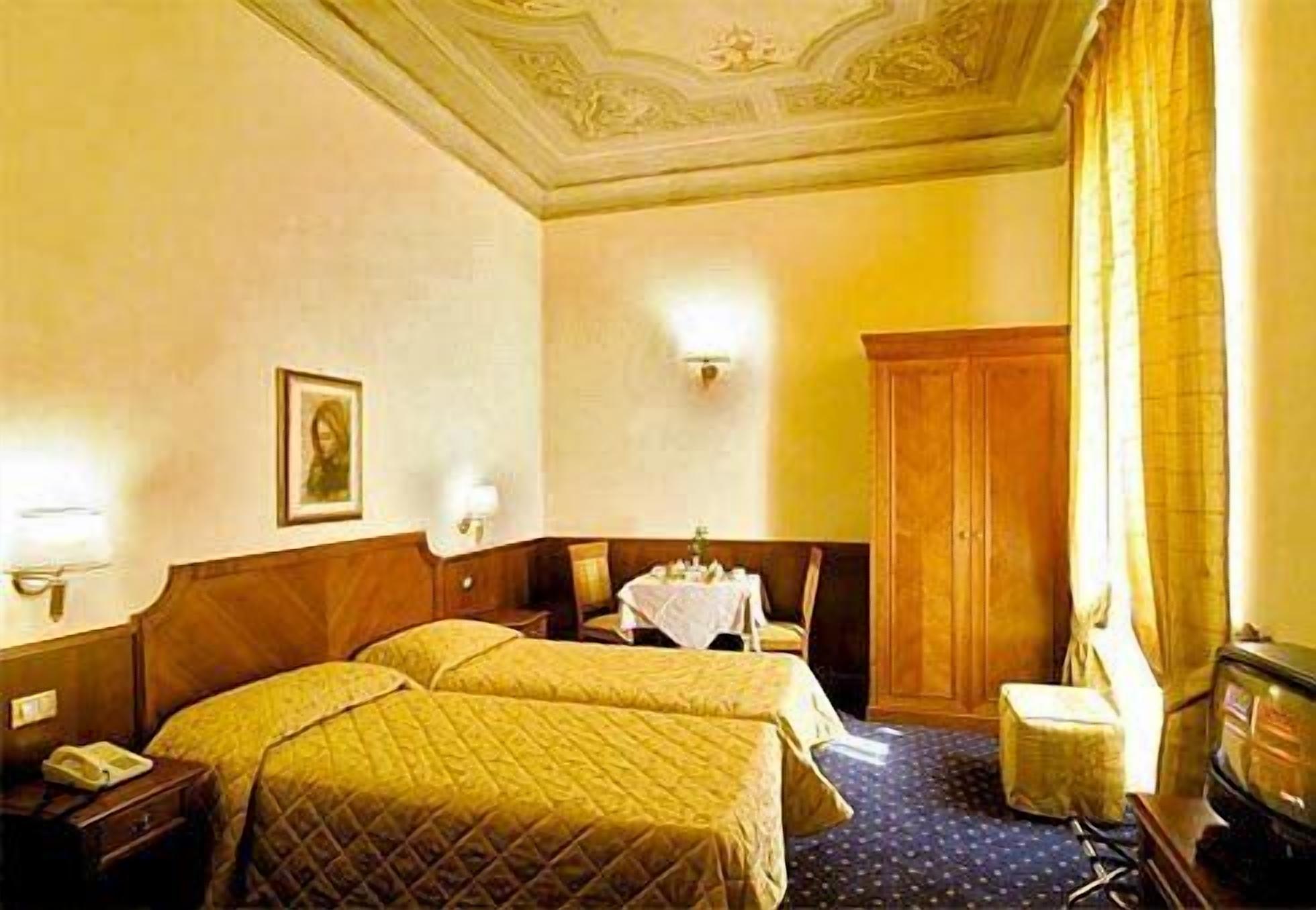 Quadruple Room | Down duvets, minibar, in-room safe, individually furnished