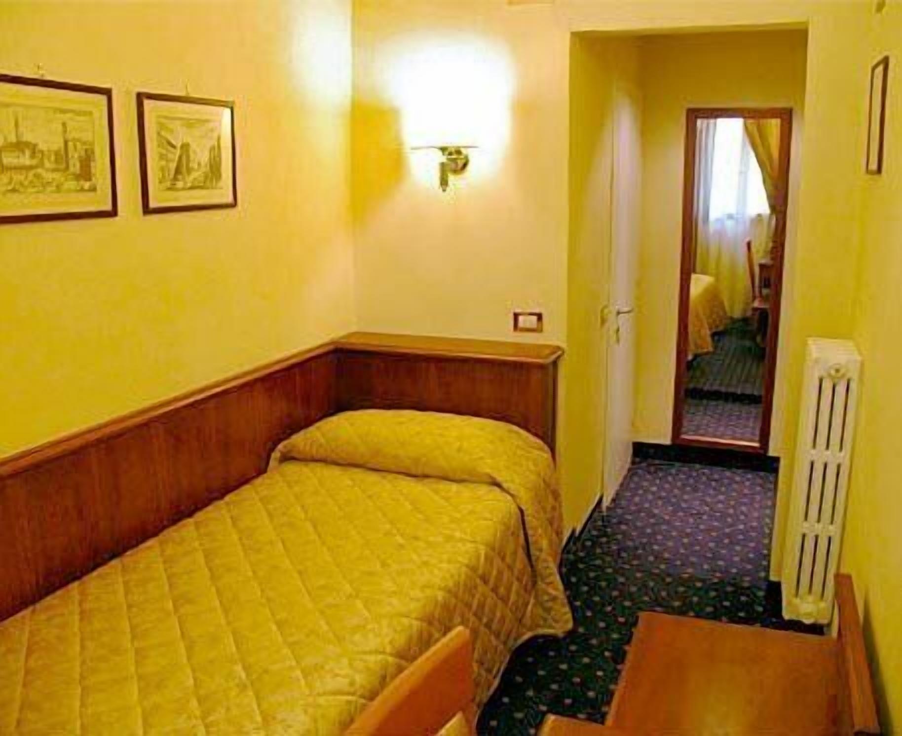 standard single room | down duvets, minibar, in-room safe, individually furnished