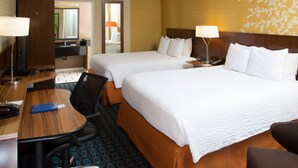 A hotel room with two beds, a desk, a chair, a mirror, and a bathroom. - Fairfield Inn by Marriott Anaheim Hills Orange County (Anaheim)