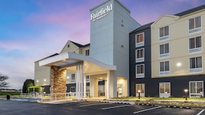 A Fairfield by Marriott hotel with a modern design, featuring a prominent entrance and multiple floors.