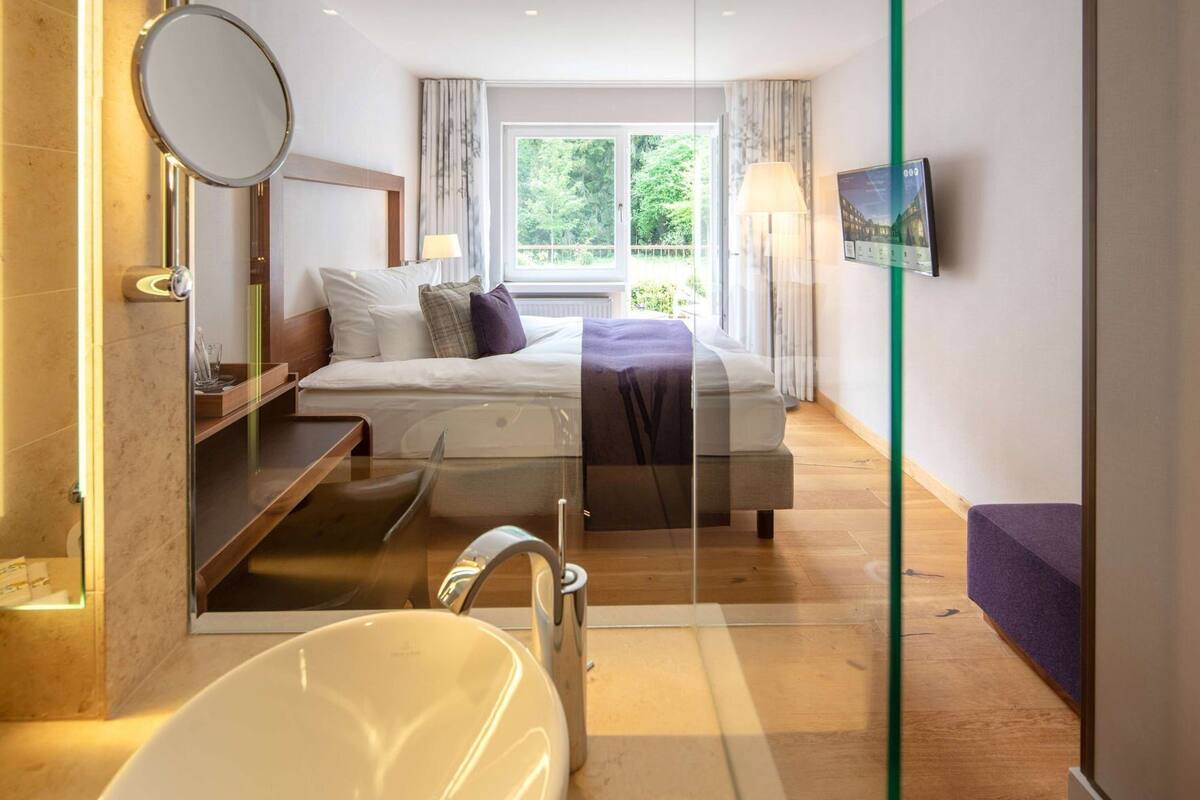 Premium bedding, down comforters, pillowtop beds, minibar