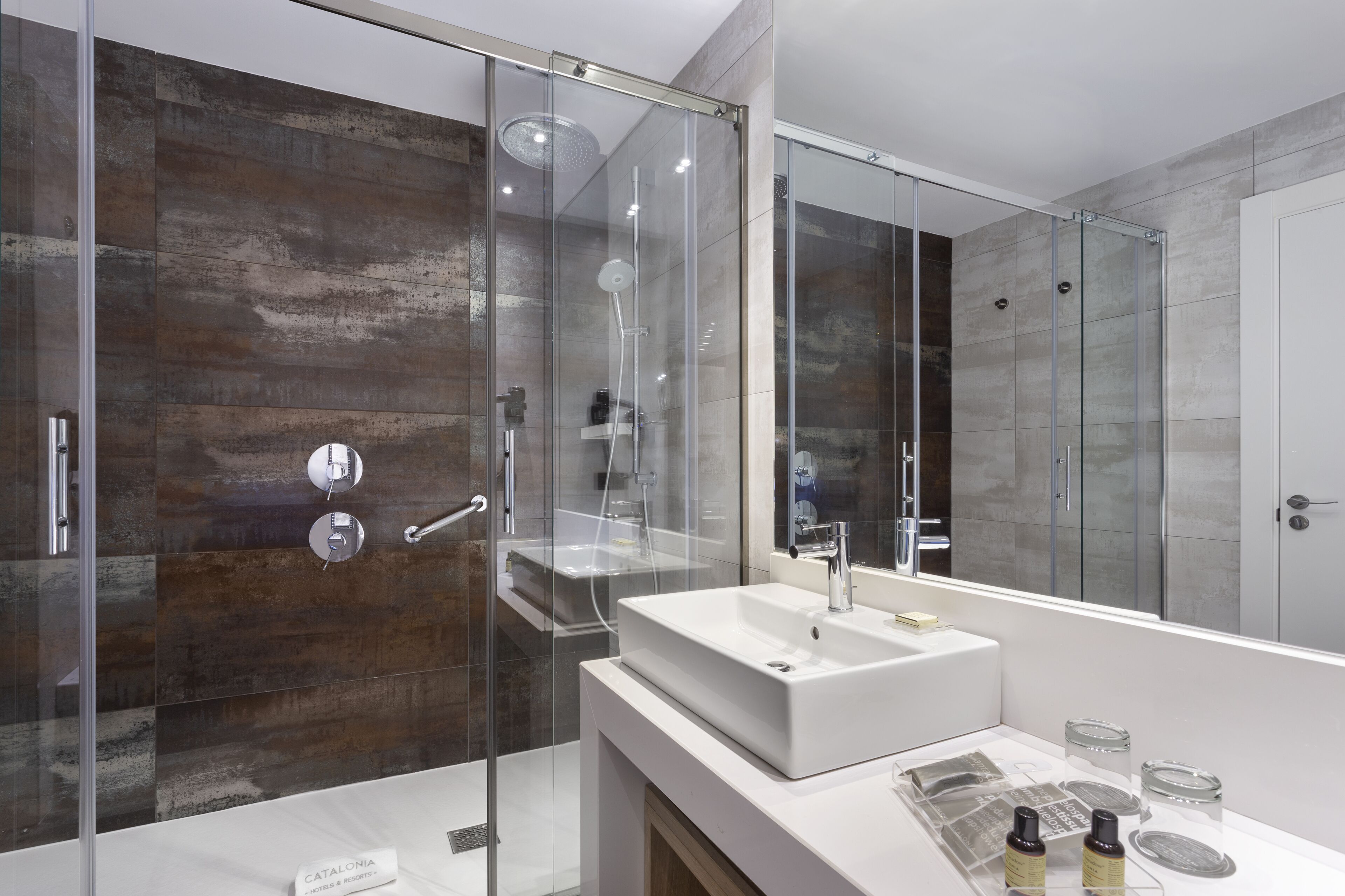 eco-friendly toiletries, hair dryer, towels