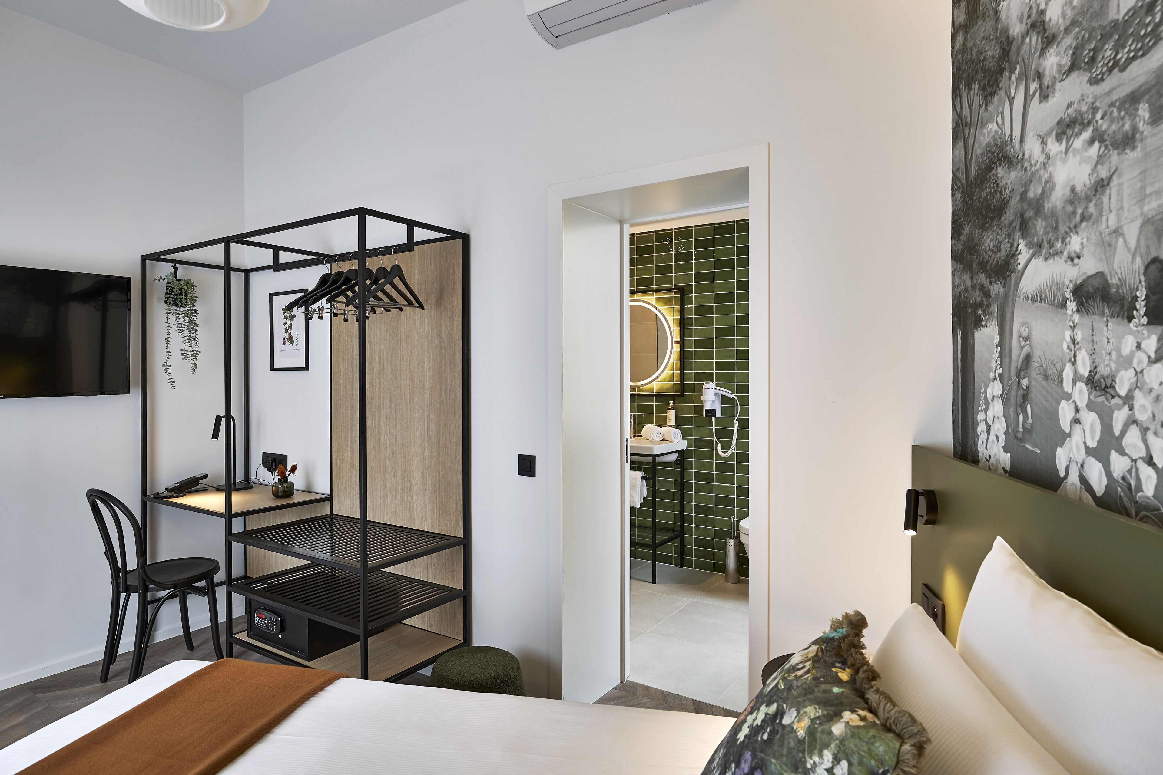 superior triple room (gardener) | in-room safe, individually decorated, blackout curtains