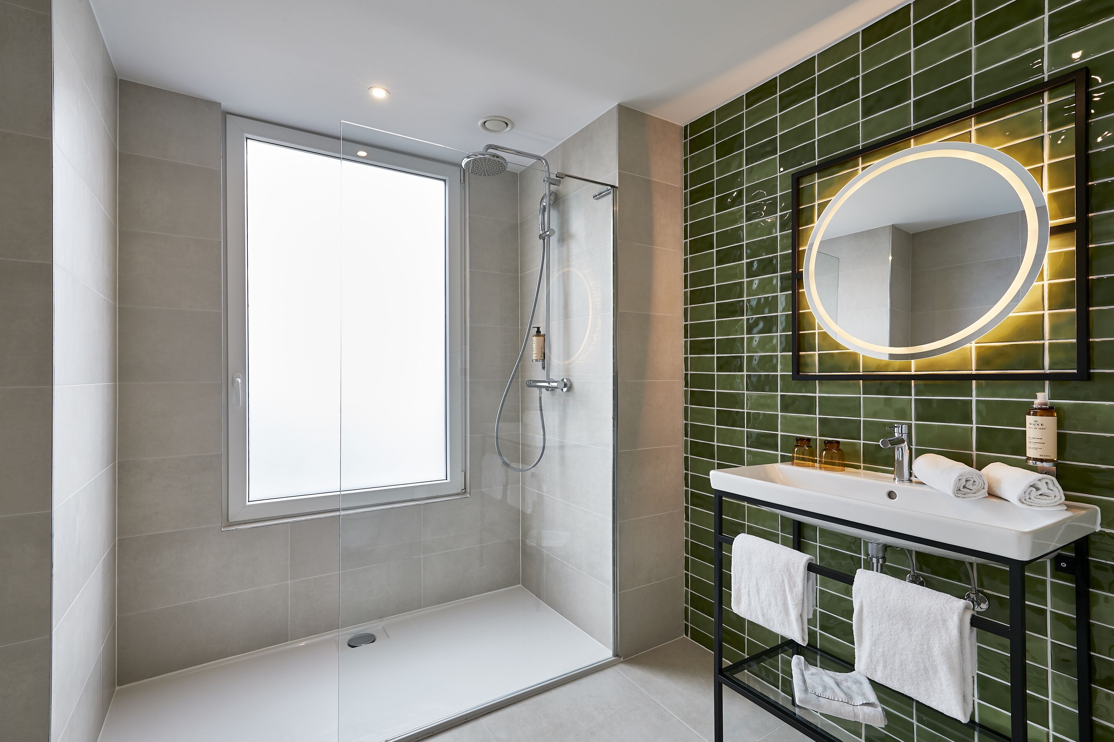 superior quadruple room (botanist) | bathroom | shower, free toiletries, hair dryer, towels